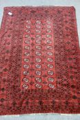 Turkoman Bokhara red ground rug, repeating gul design,