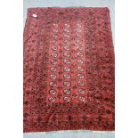 Turkoman Bokhara red ground rug, repeating gul design,