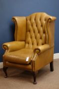 Georgian style wingback armchair upholstered in buttoned mustered leather Condition