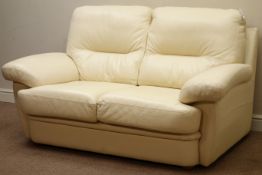Two seat sofa upholstered in cream leather,