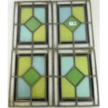 Set of four small leaded glass panels 27cm x 22.