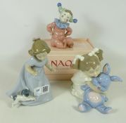 Three Nao figurines, one boxed (3) Condition Report <a href='//www.