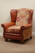 Tetrad Eastwood wingback armchair, leather upholstery with Kilim chenille loose cushions,