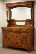 Art Nouveau period walnut dresser, five drawer and two cupboards, relief carved panels,