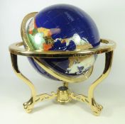 Large polished semi-precious stone terrestrial globe on gilt metal stand,