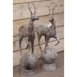 Pair cast metal garden stags on spherical mounts, figures/gate post finials,