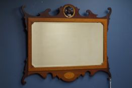 Early 20th century mahogany Chippendale style mirror, carved pediment, inlaid shell motif,