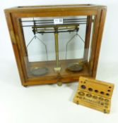 Cased set of Chemical Balance scales and a boxed set of brass metric weights (2)