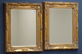 Pair small wall mirrors in ornate gilt swept frames,