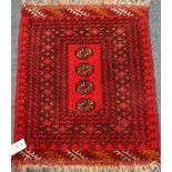 Small Persian mat rug, red ground with four guls,