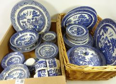 Johnson Brothers Willow pattern dinnerware and other willow pattern dinnerware in a wicker basket