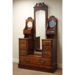 Edwardian walnut twin dressing table with centre full height mirror, fitted with nine drawers,