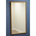 Rectangular gilt framed mirror with bevelled glass,