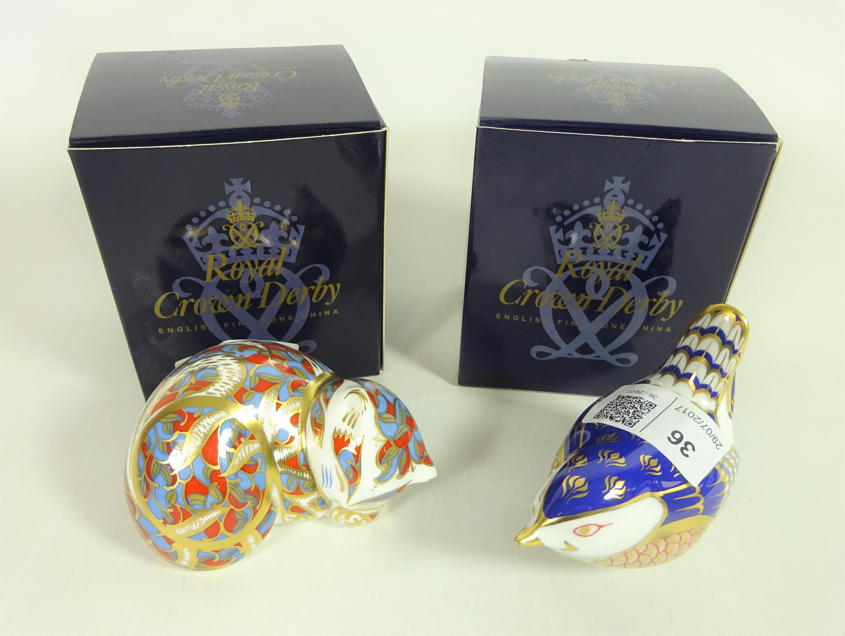 Two Royal Crown Derby paperweights Wren and Contented Kitten both with gold stoppers and boxes