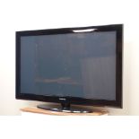 Samsung 50" plasma television on stand with remote (This item is PAT tested - 5 day warranty from