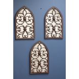 Three arched cast iron gothic style wall mirror,