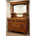 Art Nouveau period walnut dresser, five drawer and two cupboards, relief carved panels,
