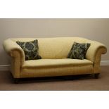 Victorian Chesterfield sofa upholstered in pale gold fabric,
