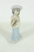 Lladro figure of a girl holding a puppy no. 5645 H20.