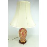 Oriental style pottery table lamp with gilded floral decoration on stand,