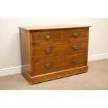 Edwardian walnut chest fitted with two short and two long drawers,