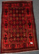 Bakhtiari red ground rug, geometric design,