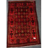 Bakhtiari red ground rug, geometric design,