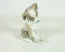 Lladro figure of a dog with a snail on paw no. 6211, H13.