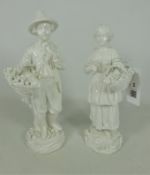 Pair of 19th Century Dresden blanc de chine figures of a male and female with fruit and flower