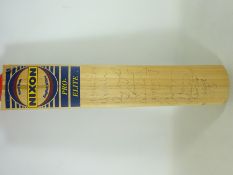 Cricket bat signed by various cricket players