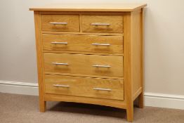 Light oak chest fitted with two short and three long drawers,