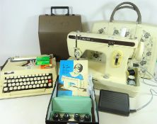 Vintage Jones sewing machine with accessories and instructions and a Vintage Imperial typewriter
