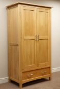 Light oak double wardrobe with single drawer,