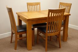 Oak rectangular dining table and four chairs,