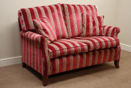 Two sofa upholstered in red striped velvet fabric, mahogany finish feet,