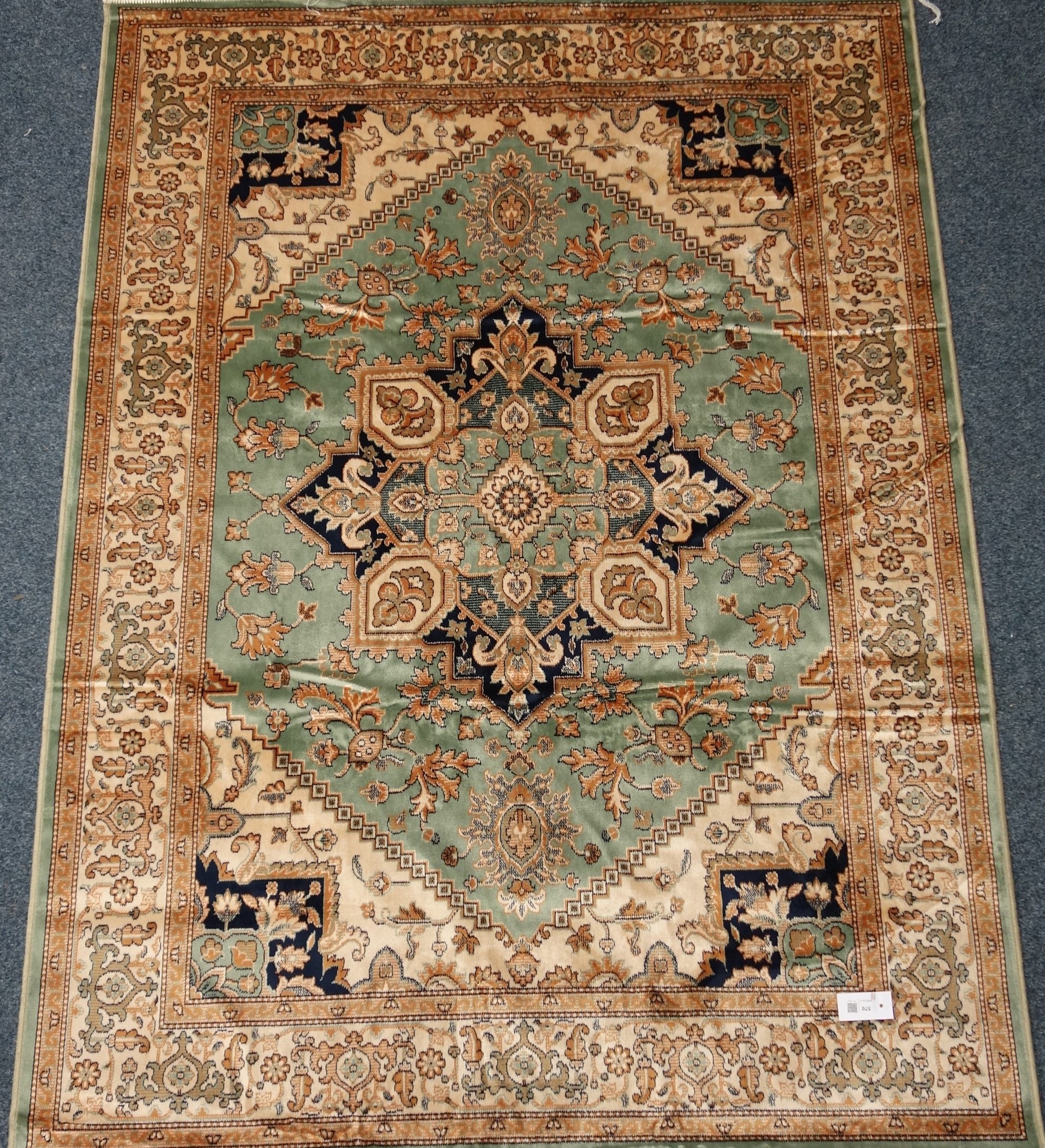 Persian Heriz design green and beige ground rug/wall hanging,