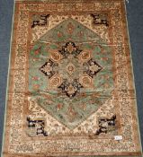 Persian Heriz design green and beige ground rug/wall hanging,