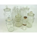 Seven Vintage glass storage jars, one with later lid H36cm of tallest,