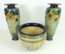 Pair of early 20th Century Royal Doulton stoneware vases with flower decoration no.
