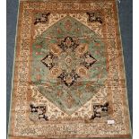 Persian Heriz design green and beige ground rug/wall hanging,