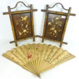 Pair of 19th Century Shibayama panels decorated with birds and panels,