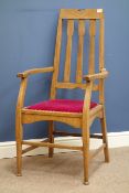 Arts and Crafts period William Birch oak armchair, shaped back splats and pierced top rail,