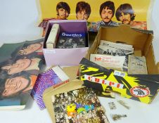 Three original Beatles posters, 'The Beatles' brooches and pendant,