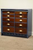 Early 20th century railway type chest, ten graduating drawers, with brass cup handles,