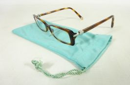 Pair of Tiffany & Co tortoiseshell effect glasses with heart detail to the arms,