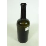 Late 18th/ early 19th Century English cylindrical shaped dark olive green wine bottle with string