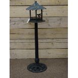 Wrought metal floor standing bird feeder ,
