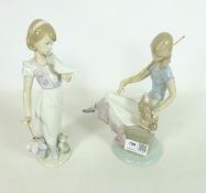 Two Lladro figurines; 'Summer Stroll' and 'Picture Perfect',