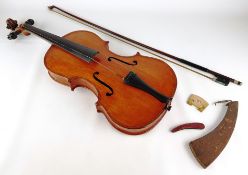 20th Century violin with a two piece birds eye maple back and sides, and bow. LOB. 35.