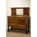 Early 20th century oak sideboard with bevelled mirror back,